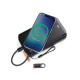 Câble de charge noir connecté à un smartphone posé sur un chargeur noir pliable, avec cordon tressé, connecteur détachable à mou Câble de charge noir connecté à un smartphone posé sur un chargeur noir pliable, avec cordon tressé, connecteur détachable à mou