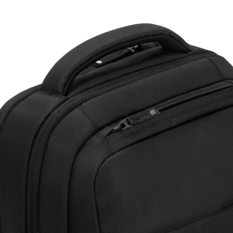 Gros plan sur la partie supérieure du sac à dos noir, montrant sa poignée de transport rembourrée, les coutures du tissu texturé