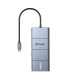 Vue de face d’un hub USB-C gris bleuté métallisé, au boîtier rectangulaire allongé divisé en quatre sections, avec un logo au ce Vue de face d’un hub USB-C gris bleuté métallisé, au boîtier rectangulaire allongé divisé en quatre sections, avec un logo au ce