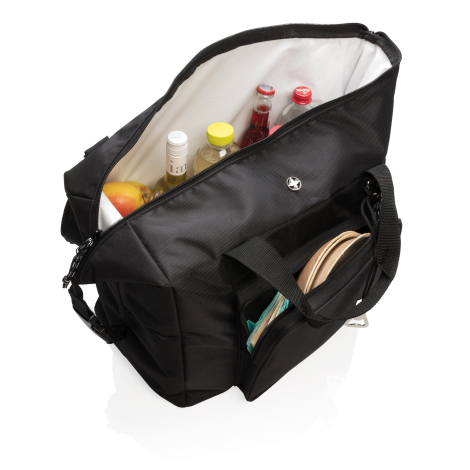 Vue plongeante du sac isotherme noir ouvert, révélant une doublure intérieure blanche et un compartiment contenant des bouteille
